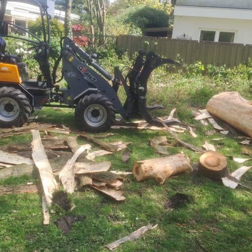 Machinaal afvoeren van gezaagde stamdelen